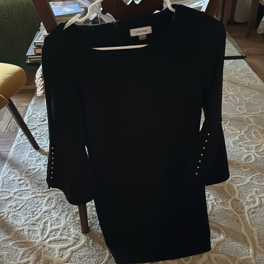 Calvin Klein bell sleeved dressed with detailed pearls on side of sleeves